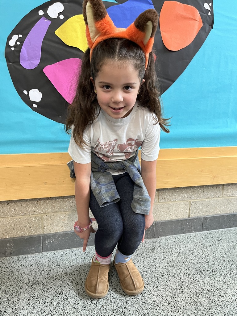 A student dress in  an outfit with a rhyming theme.