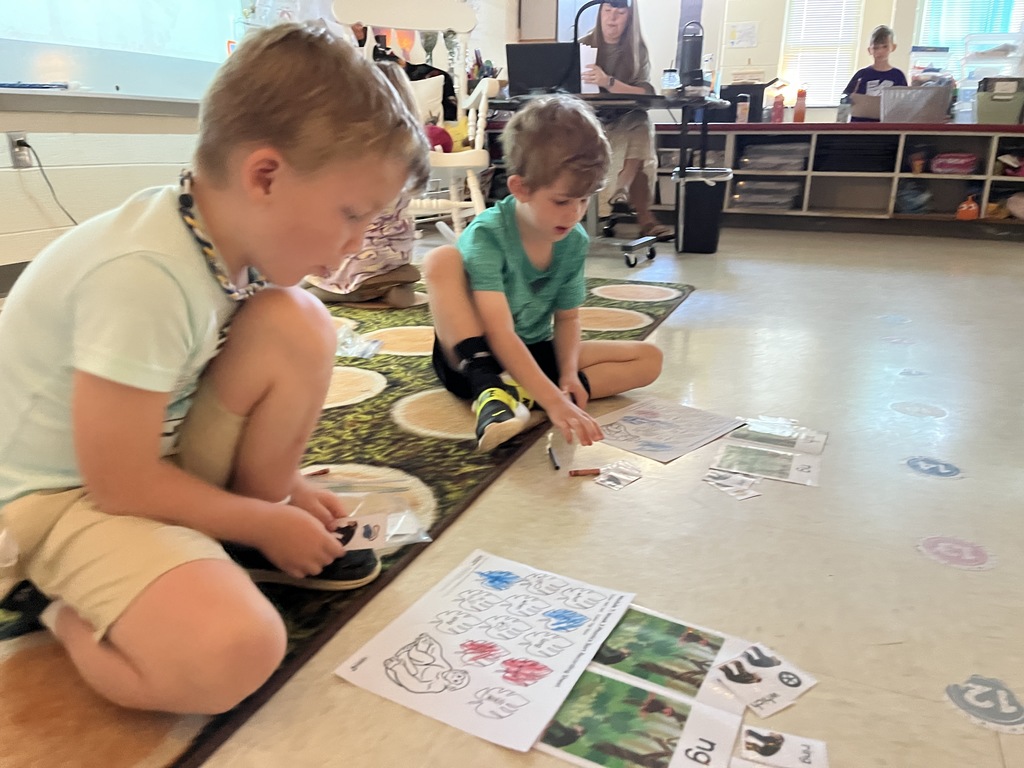 Students hard at work in a literacty station in class. 
