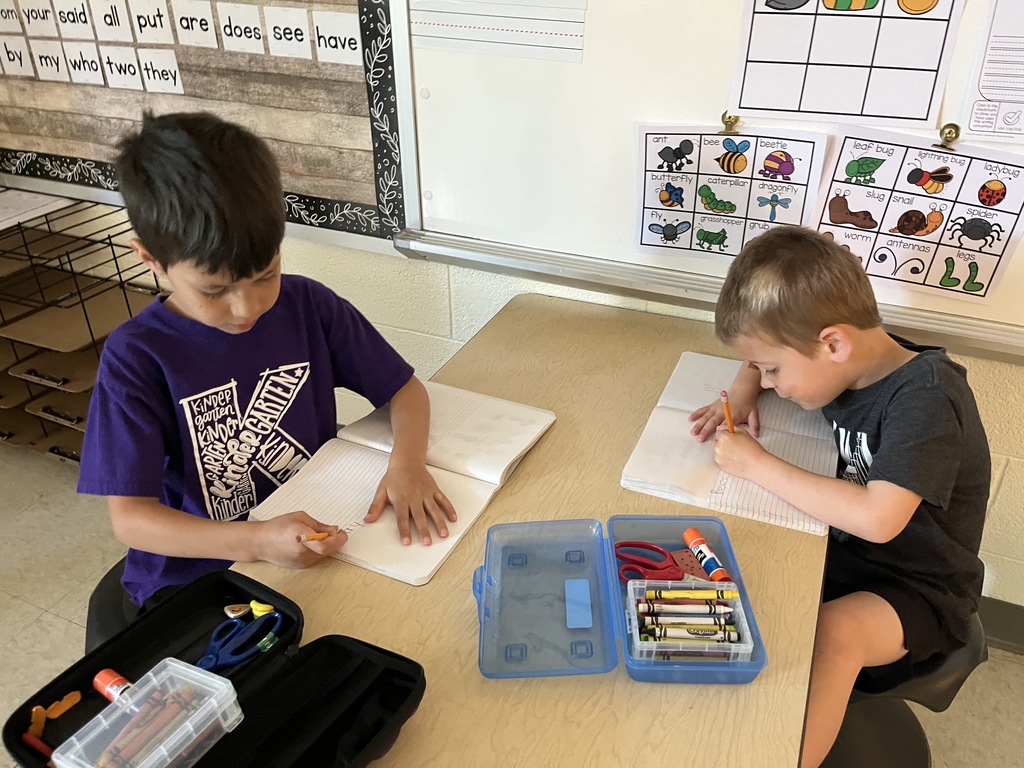 Students hard at work in a literacty station in class. 