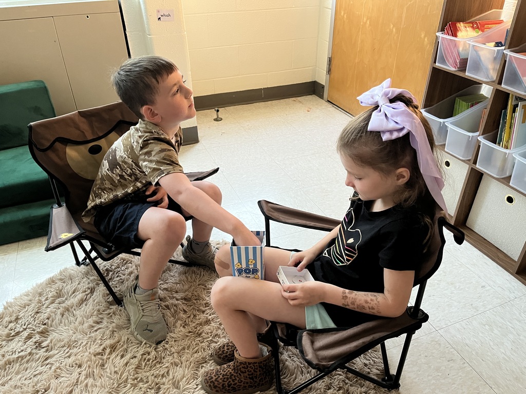 Students hard at work in a literacty station in class. 