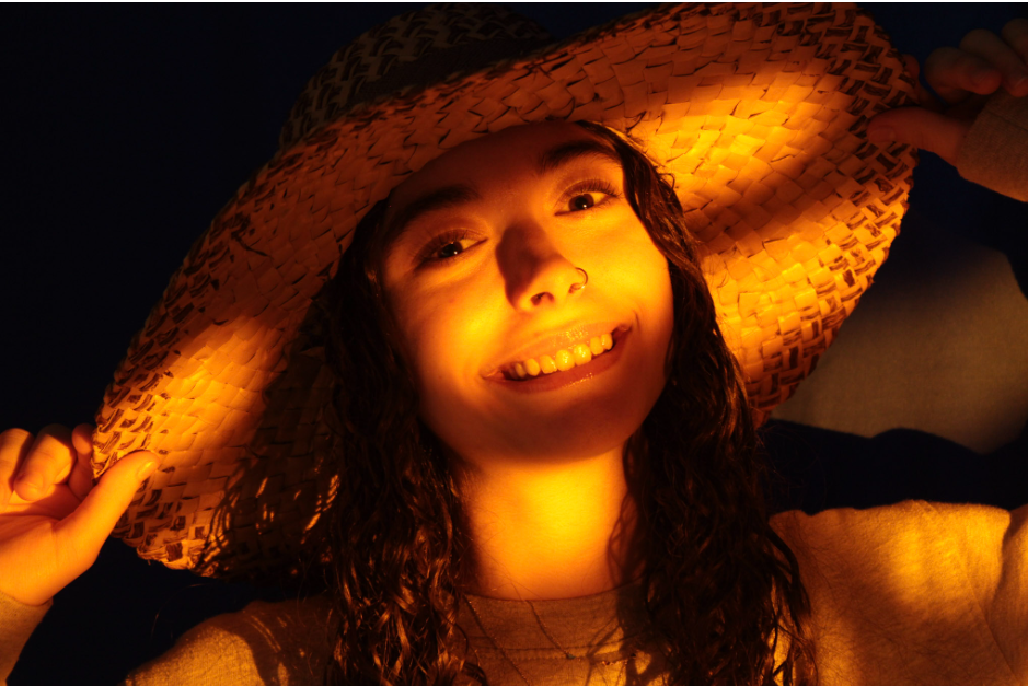 An artistic portrait photograph using  lighting. 