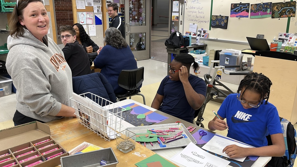 Students in an adaptive art class work on a Van Gogh-themed project.