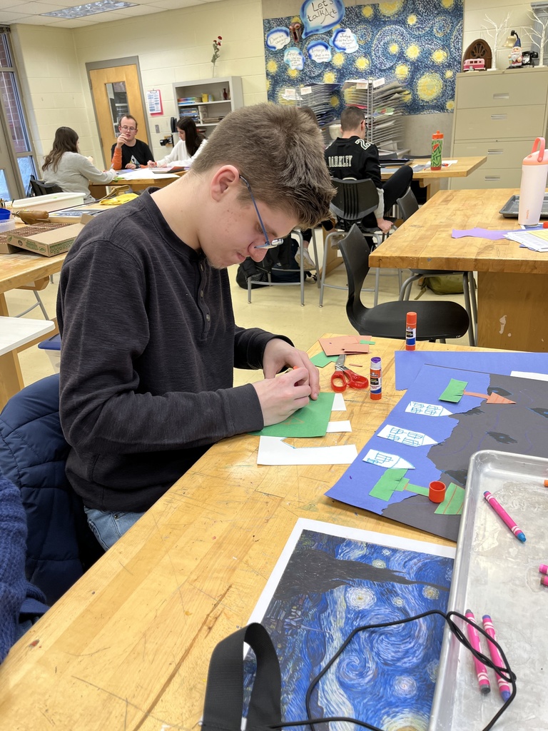 Students in an adaptive art class work on a Van Gogh-themed project.