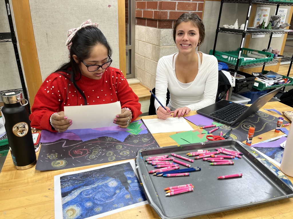 Students in an adaptive art class work on a Van Gogh-themed project.