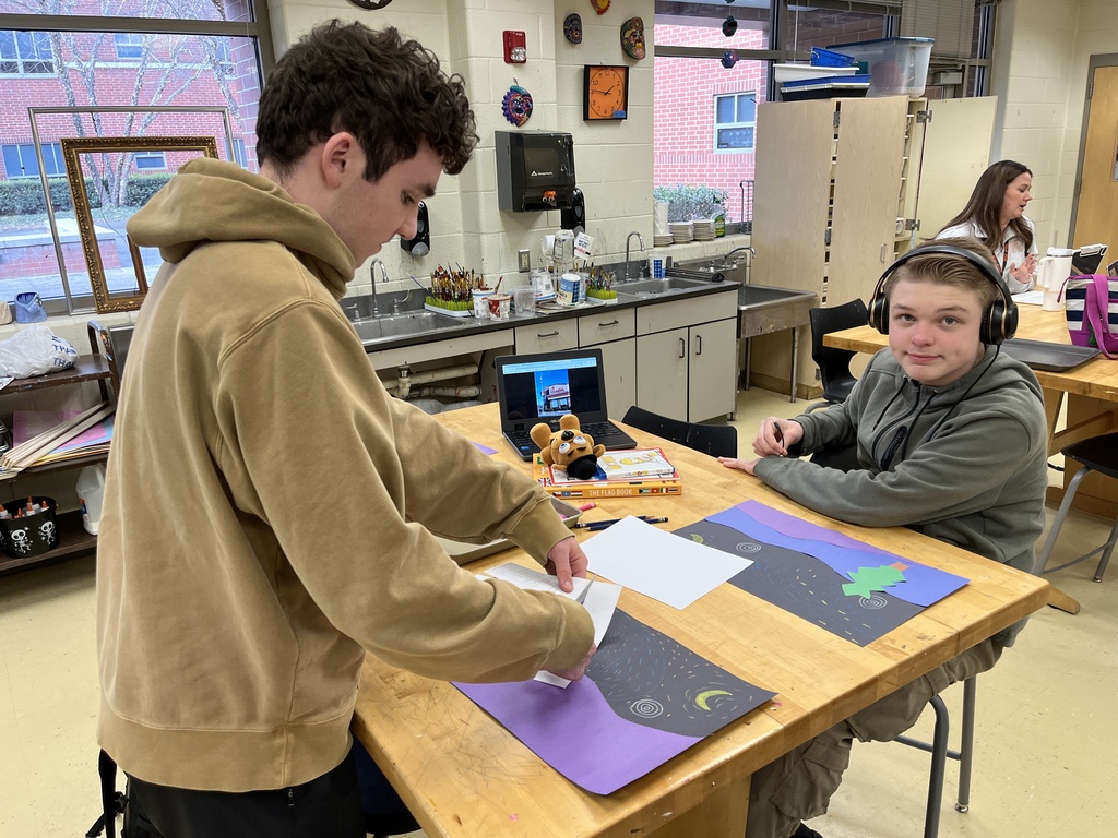 Students in an adaptive art class work on a Van Gogh-themed project.