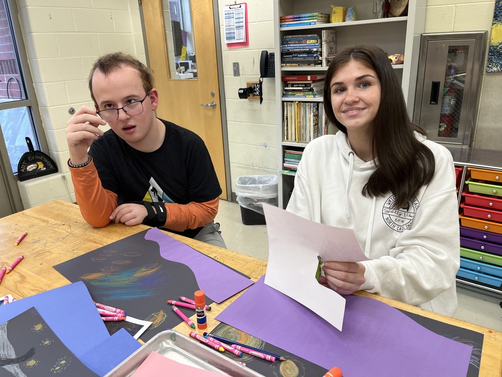 Students in an adaptive art class work on a Van Gogh-themed project.