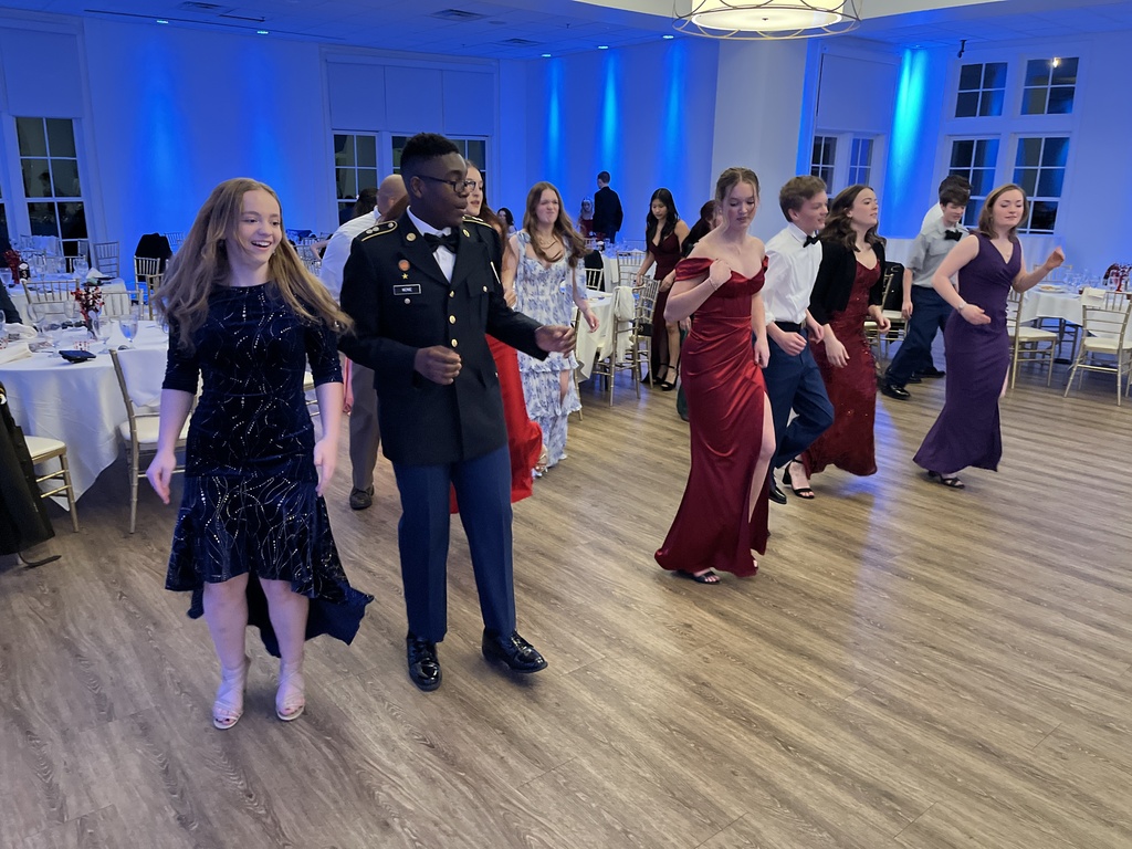 Students  dance during a JROTC military ball.