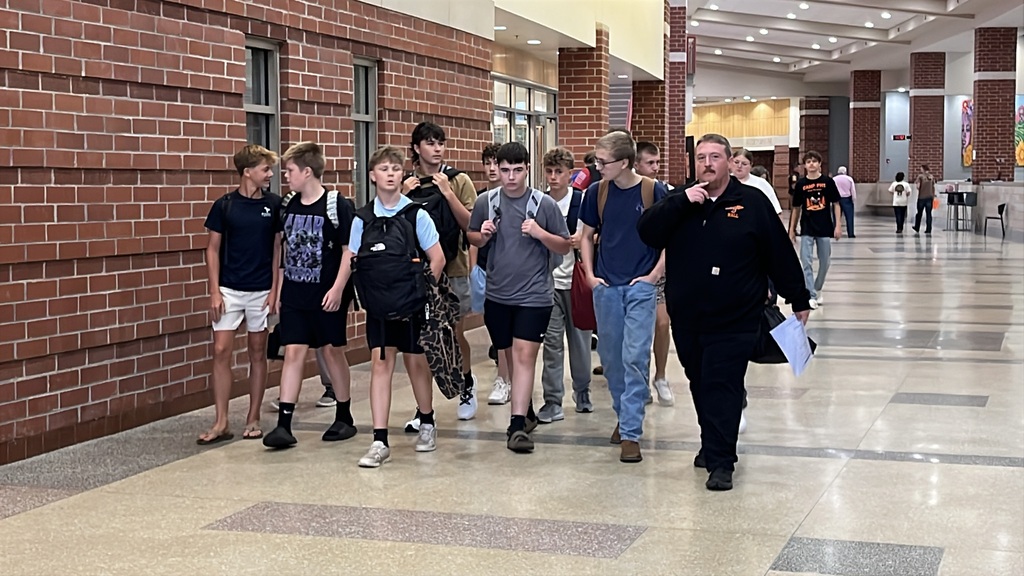 Staff and upperclassmen give freshmen a school tour on the first day of school.