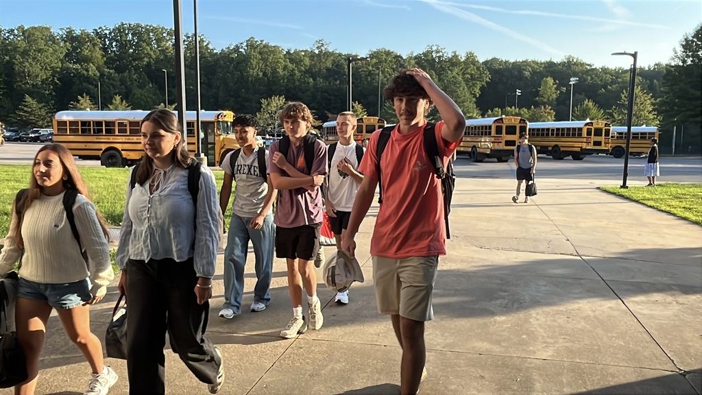 Students walk into the high school on the second day of school.