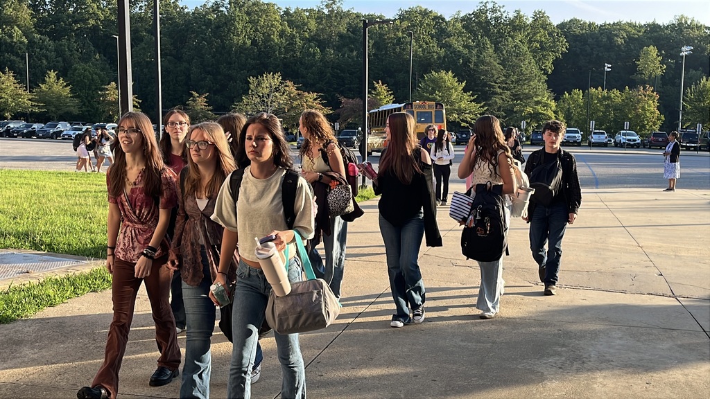 Students walk into the high school on the second day of school.