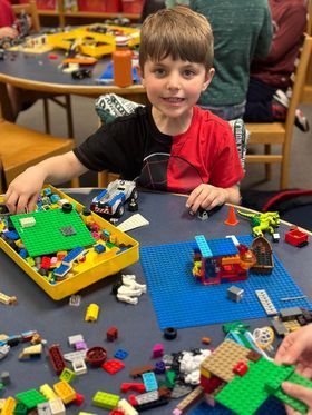 A child plays with Legos