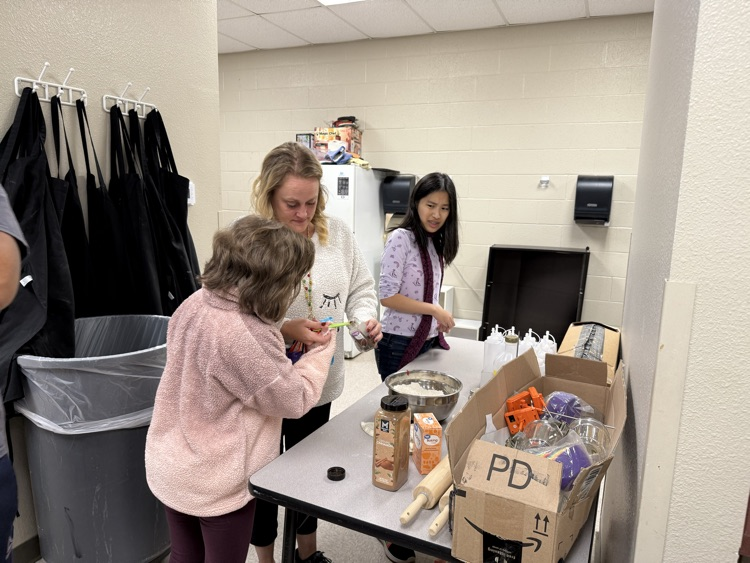 students baking cookie dough 
