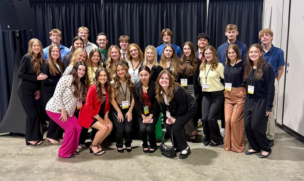 Group of 27 high school DECA students together at the state conference
