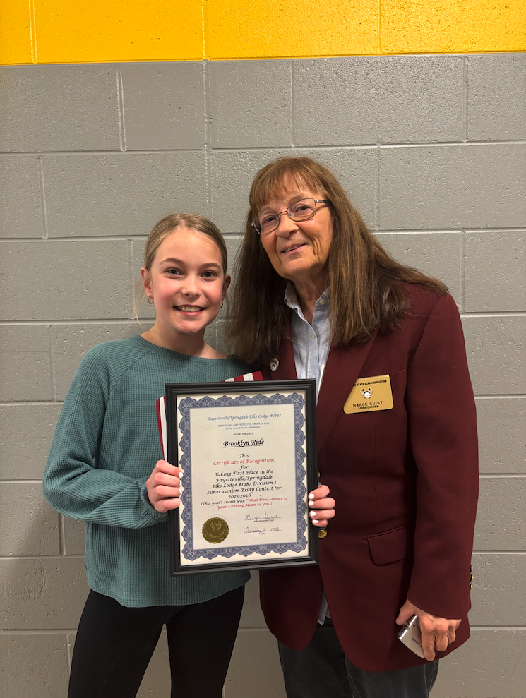 Student, Brooklyn, with Elks Lodge representative holding her award