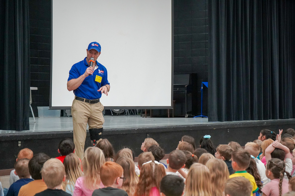 Darby Bybee talking to kindergartners in a weather assembly