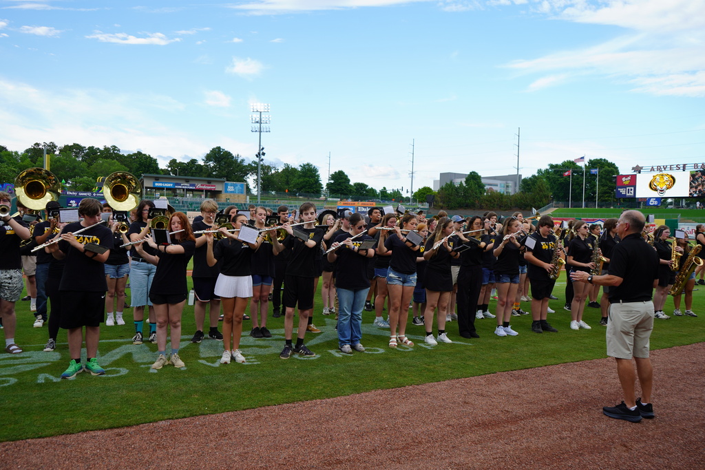 The High School Band Performing Pre-Game