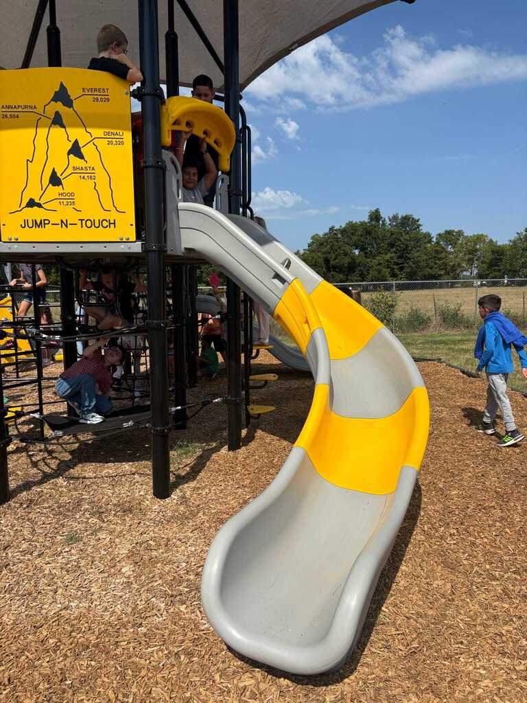 Students using the new playground equipment