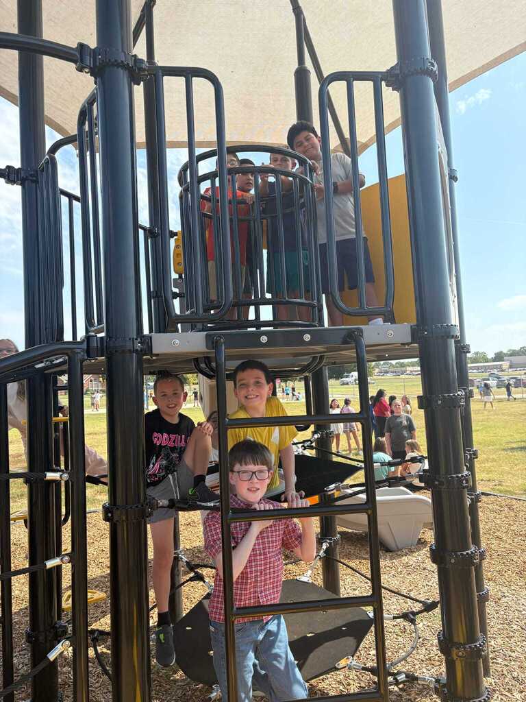 Students using the new playground equipment