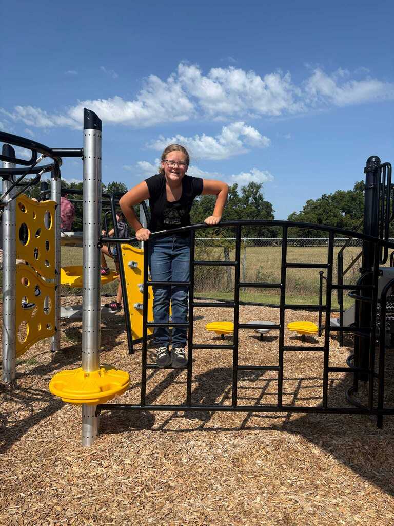 Students using the new playground equipment