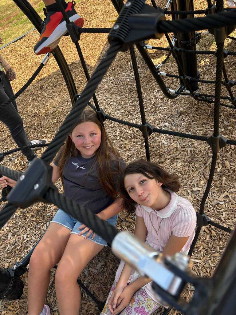 Students using the new playground equipment