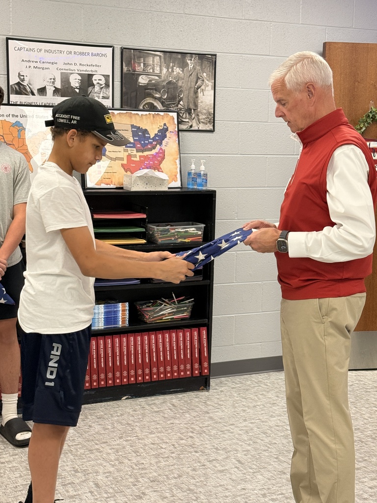 Practicing folding the flag