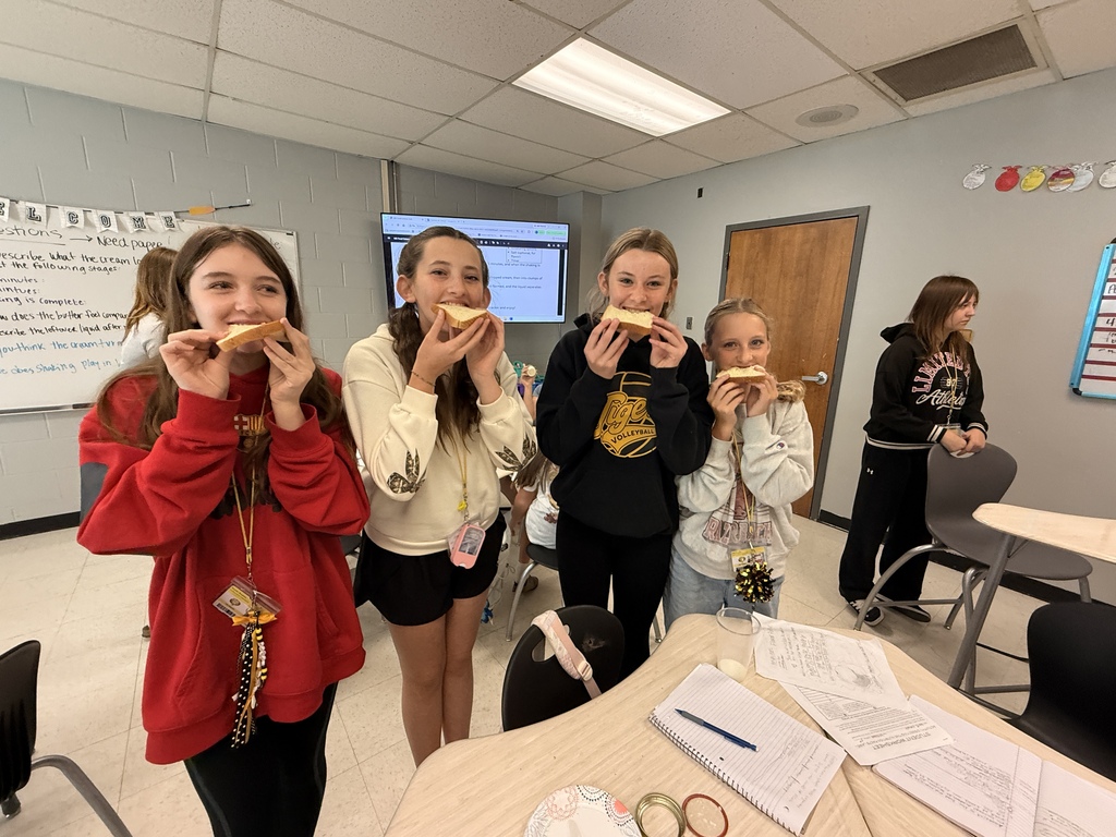 Four students sample their butter
