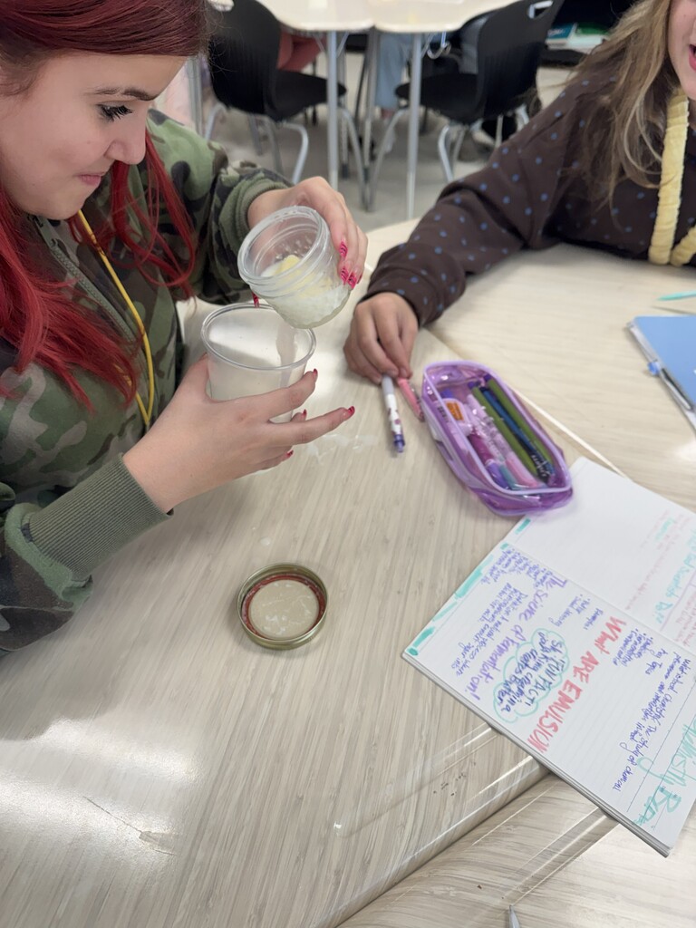 A student separates her butter.