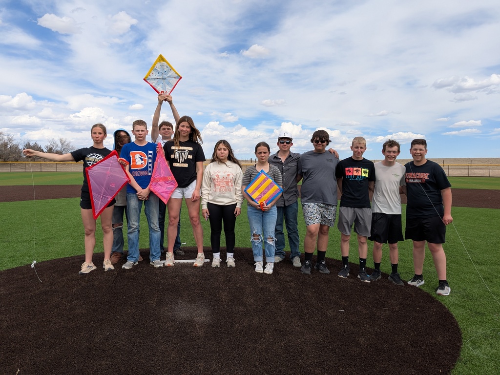 Geometry students after flying kites. They didn't work as well as hoped