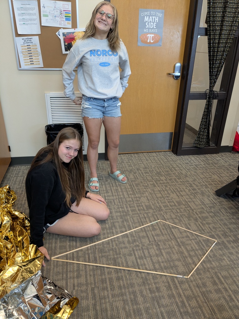 students work on building kites