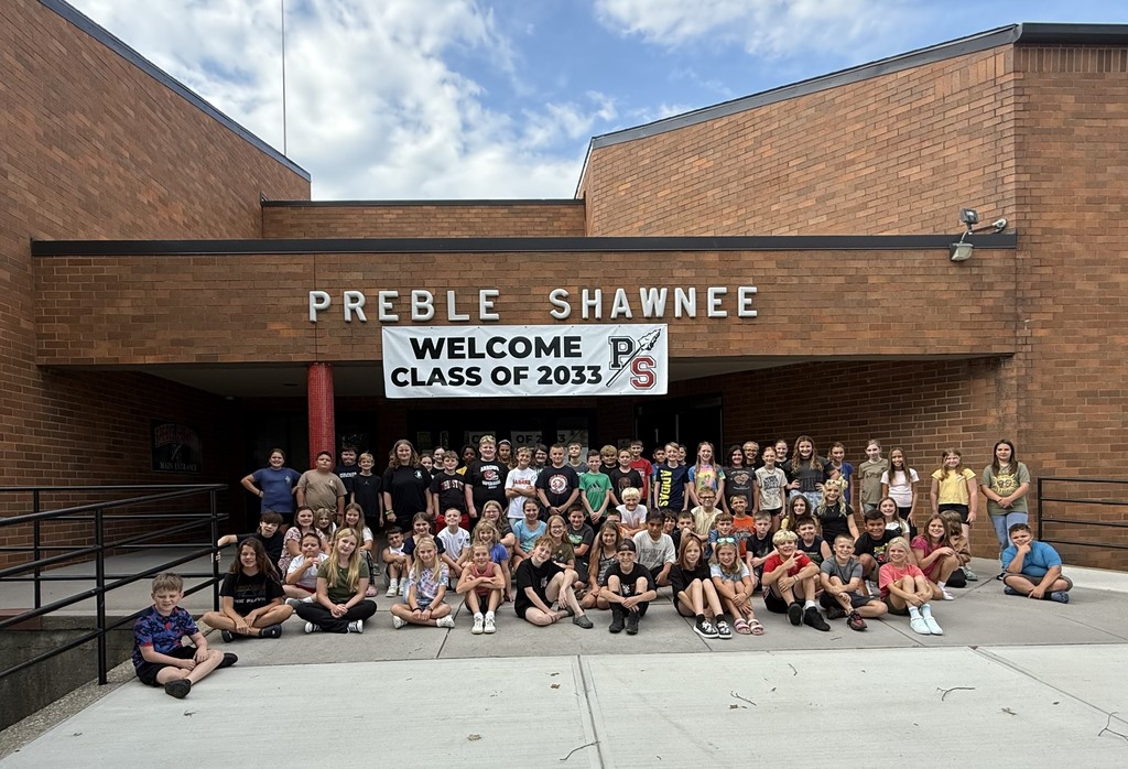 kids in front of school