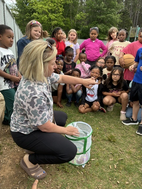 2nd grade classes releasing butterflies