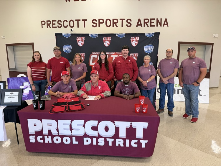 Student with coaches and college reps