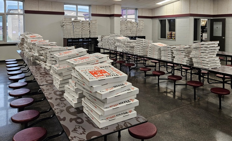 pizza boxes stacked up