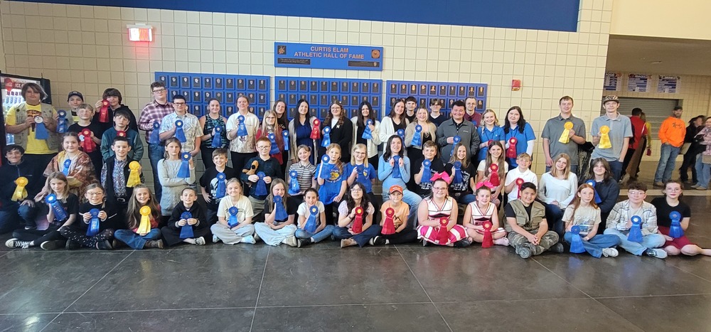 students pose with math field day awards