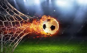 soccer ball on fire going through the back of a soccer net