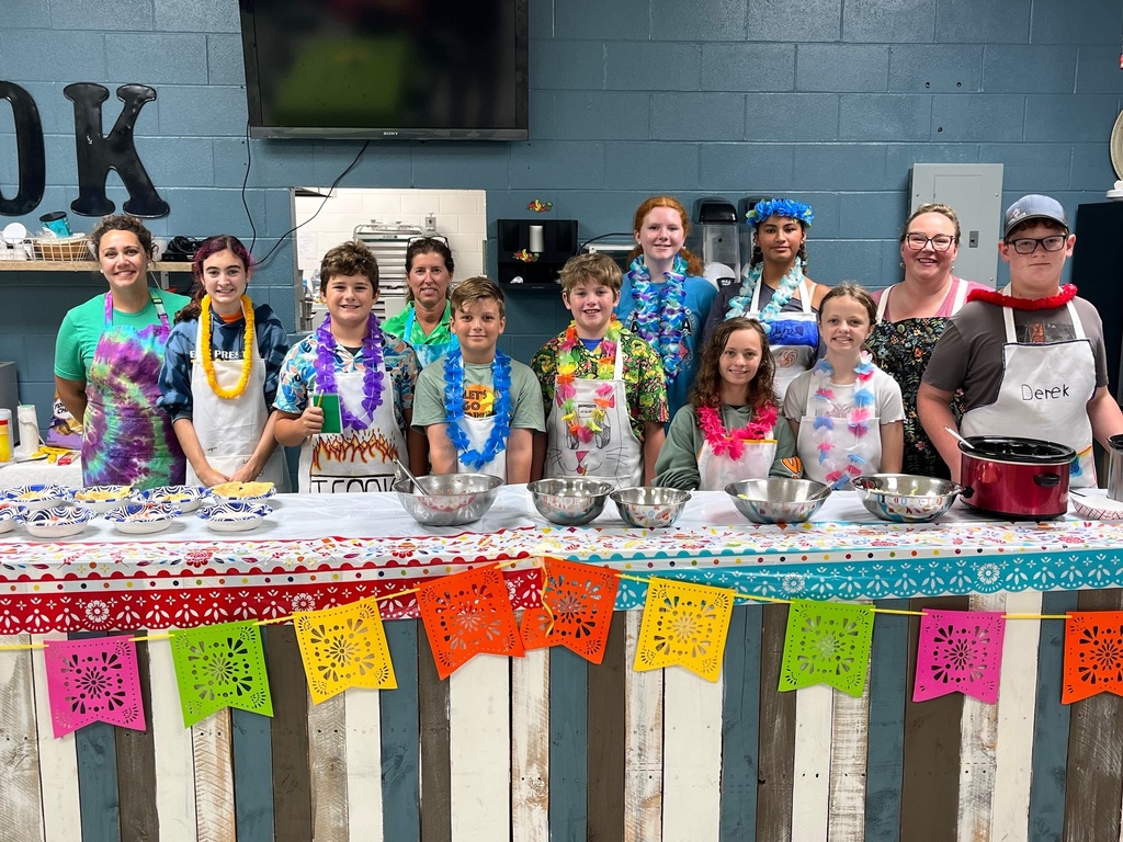 students pose during a culinary camp