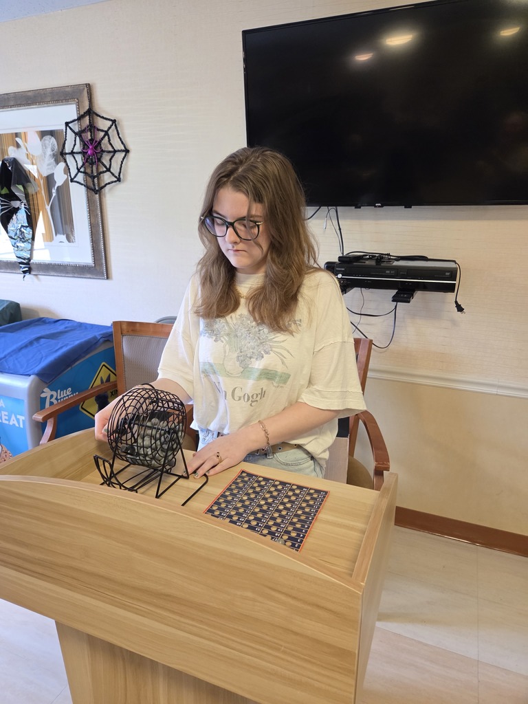 student choosing bingo numbers