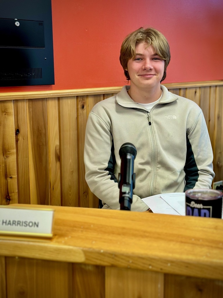 students pose with board members to be recognized for achievement