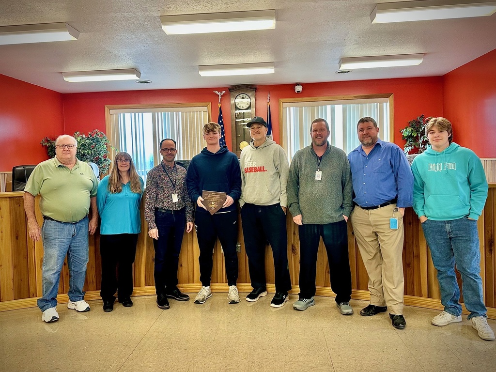 students pose with board members to be recognized
