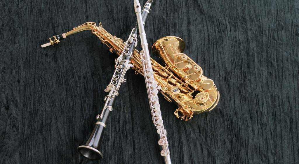 Picture of woodwind instruments tying to the message about doing well at the band festival. 