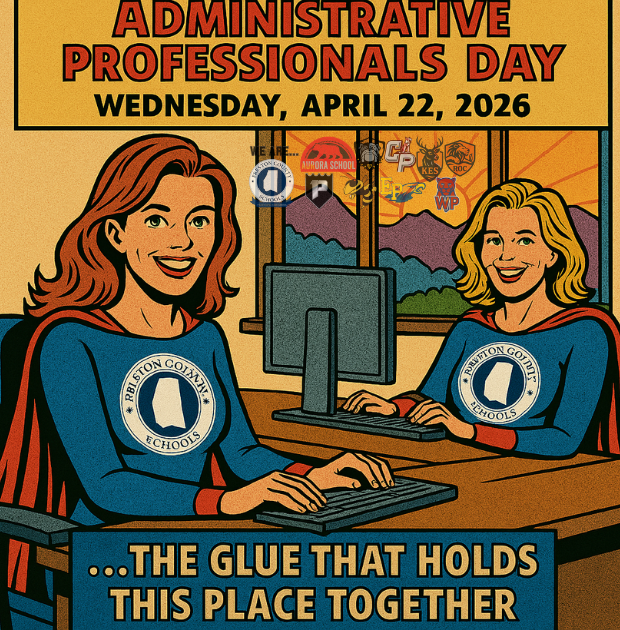 two female superheroes sitting at desks working on computers