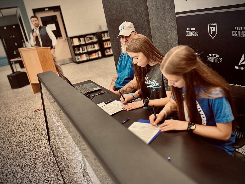 students signing letters of intent for college sports