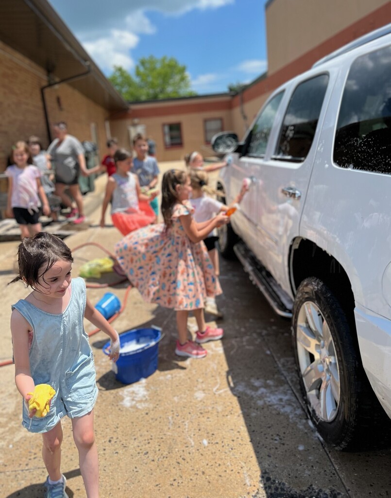 The "Principal's Car Wash" was a splashing success!