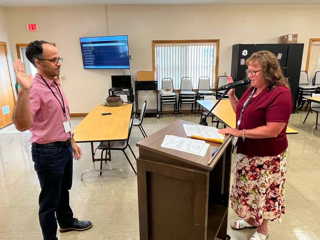 board member sworn into office