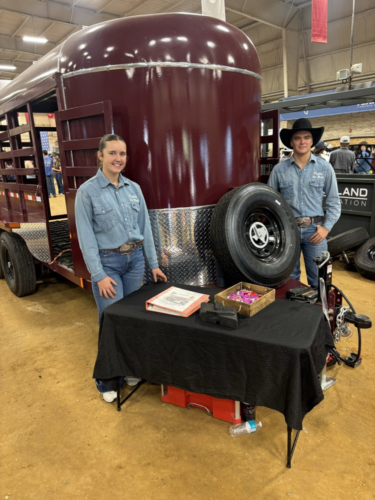 Sadie and Wyatt with their trailer.