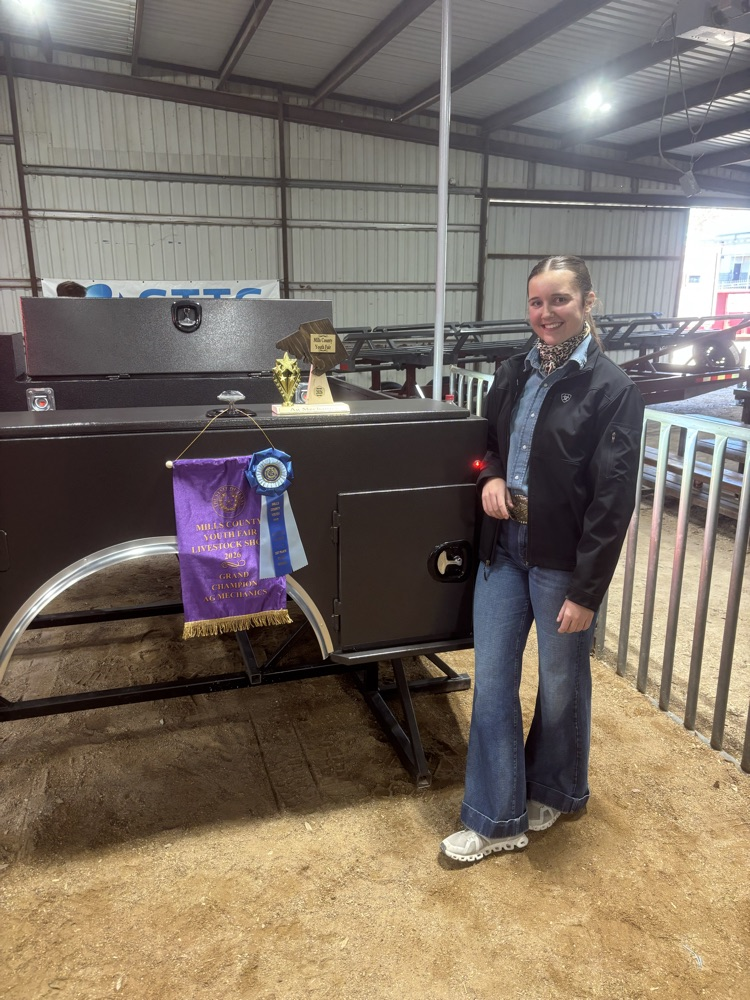 Sadie standing with her flat bed 