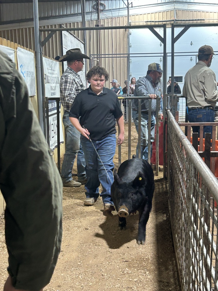 Treagan Schoenhals with his cross