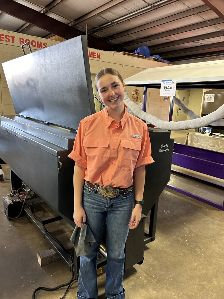 Addie Buffe with her feeder.