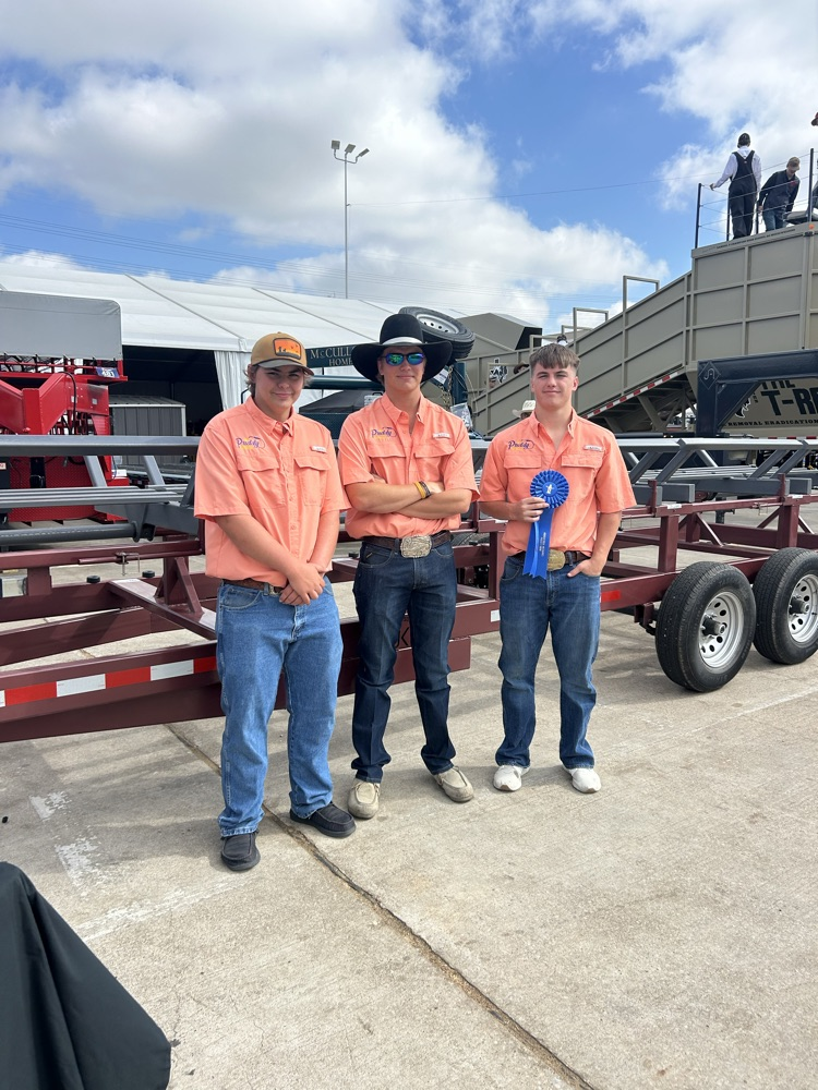 Matthew, Wyatt, and Shane with their hay trailer
