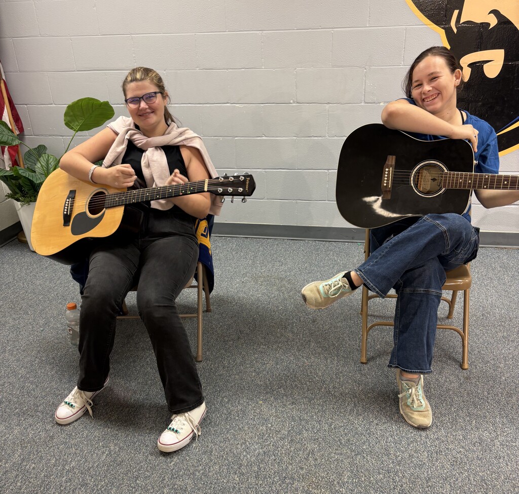 Breta and Katelinn ready to strum!
